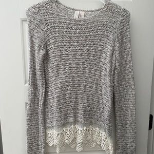 knitted sweater with lace on the bottom
